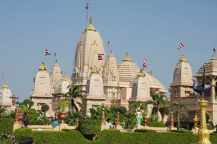 Nilkanthdham, Swaminarayan temple an extensive religious complex with pagodas, fountains, statues   carved idols and gates, located at Poicha, Gujarat, India Nilkanthdham, Swaminarayan temple an extensive religious complex with pagodas, fountains, statues   carved idols and gates, located at Poicha, Gujarat, India, by Zoonar RealityImages