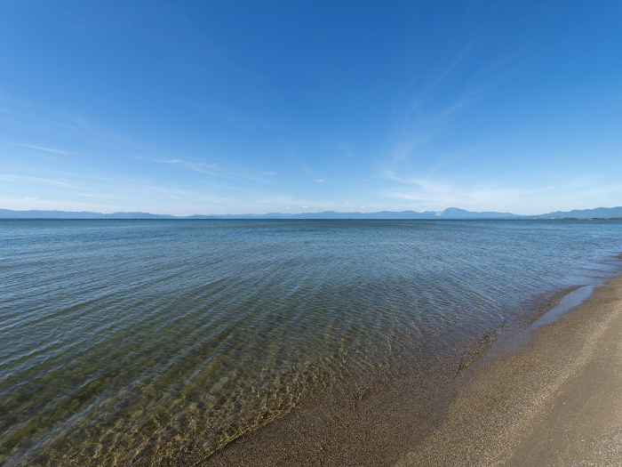 A view of Lake Biwa from a sandy beach in Hikone City, Shiga Prefecture, Japan