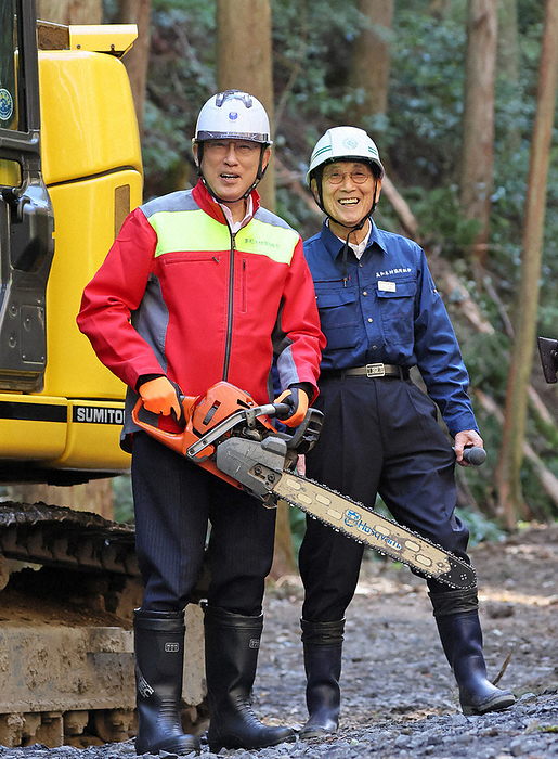 Prime Minister Fumio Kishida observes forestry logging and silviculture operations in a mountain forest and feels the weight of a chainsaw. Prime Minister Fumio Kishida  left  inspects logging and silviculture operations in a mountain forest and feels the weight of a chainsaw at 1:15 p.m. on October 7, 2023 in Hitachi Omiya, Ibaraki Prefecture  representative photo .