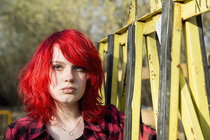 Angry young teenage defiant Punk girl portrait, by Cavan Images / Edith Drentwett