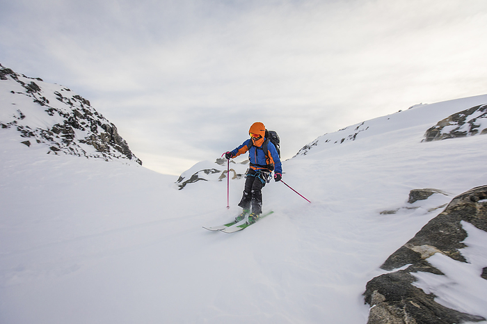 Man backcountry skiing in British Columbia, Canada, by Cavan Images / Christopher Kimmel / Alpine Edge Photography