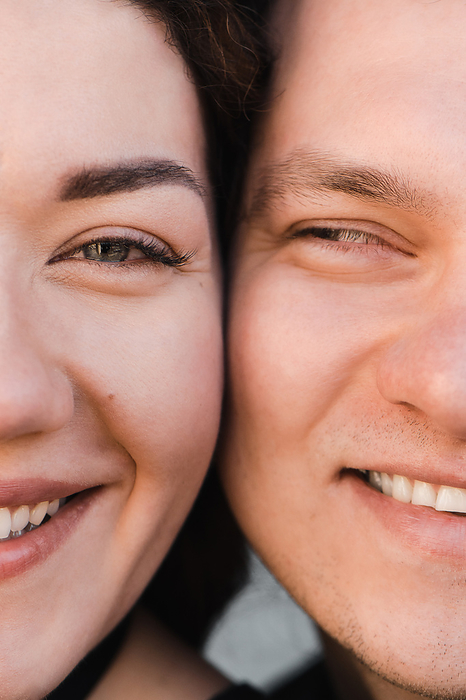 Close-up portrait of two happy faces of a couple in love, macro, by Cavan Images / Liza Zavialova
