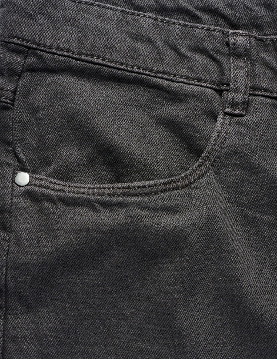 Black jeans front pocket with buttons, close up Black jeans front pocket with buttons, close up
