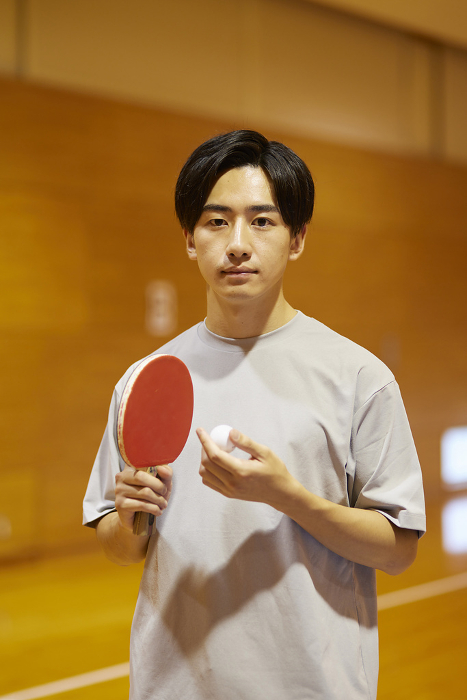 A Japanese university student practicing table tennis.