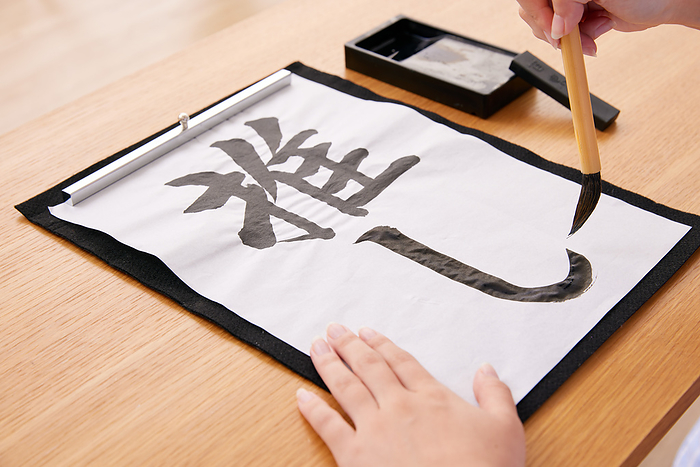 A woman's hand in calligraphy