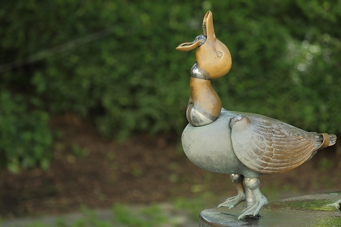 Bronze duck with open beak from the duck fountain at the Duck Square in Eltville, Rheingau, Taunus, Hesse, Germany, Europe, by Gerald Abele