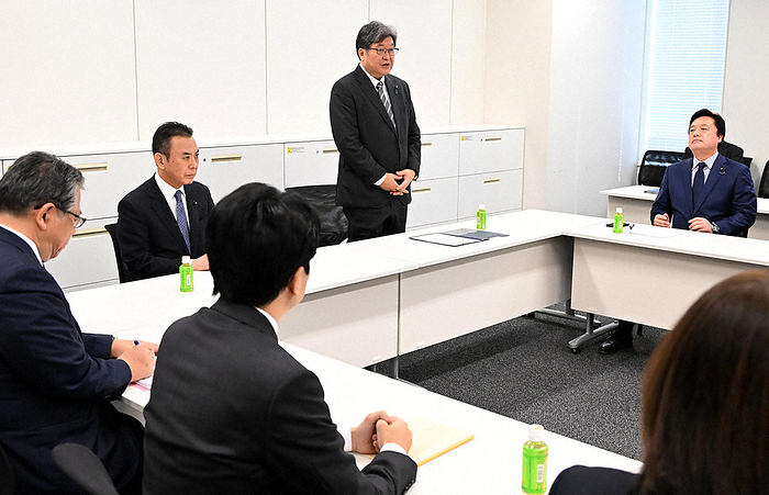 LDP policy chief Koichi Hagiuda speaks at a meeting of the ruling party s project team on the preservation of the former Unification Church s property. LDP policy chief Koichi Hagiuda  back center  speaks at a meeting of the ruling party s project team on the preservation of the former Unification Church s property. On the left is Yosuke Takagi, policy chief of the New Komeito Party, at the Second House of Representatives, October 25, 2023, at 0:03 p.m. Photo by Mikiharu Takeuchi.