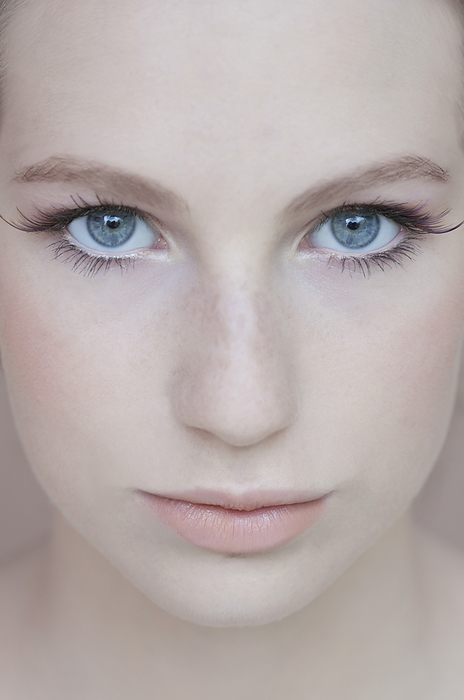 Extreme close up of young beautiful woman, by Jutta Klee