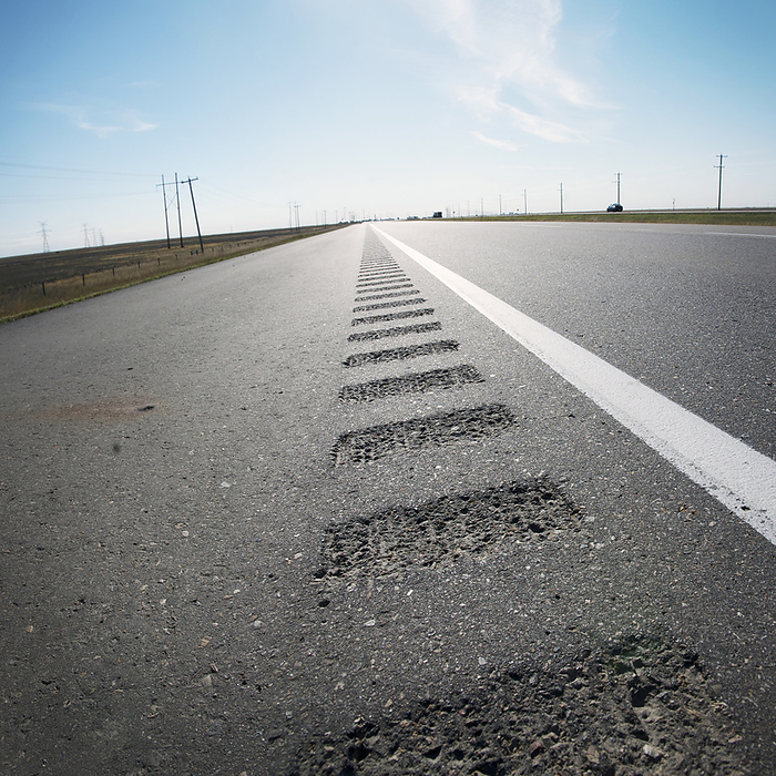Canada Close up of Rumble Strip on side of Trans Canada Highway looking East, Alberta, Canada, by Andrew Kolb   Design Pics