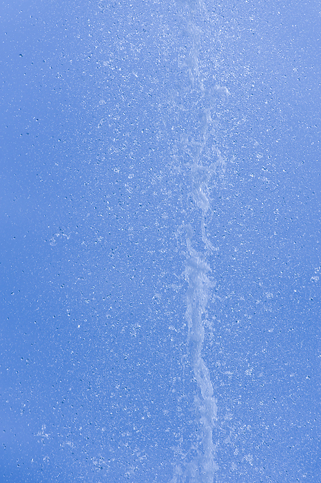 Water Drops from Water Fountain against Blue Sky, by Bettina Salomon / Design Pics