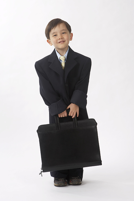Little Boy Dressed Up as a Businessman, by Edward Pond / Design Pics