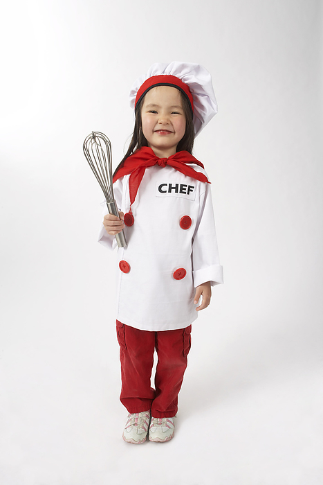 Little Girl Dressed Up as a Chef Holding a Whisk, by Edward Pond / Design Pics