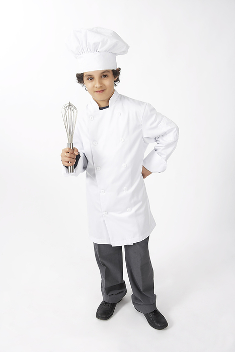 Boy Dressed Up as a Chef Holding a Whisk, by Edward Pond / Design Pics