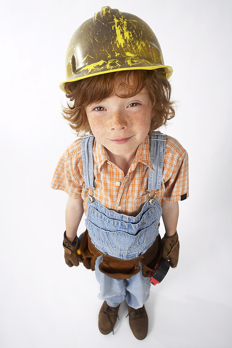 Little Boy Dressed Up as Construction Worker, by Edward Pond / Design Pics