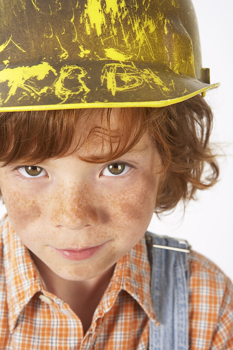 Little Boy Dressed Up as Construction Worker, by Edward Pond / Design Pics