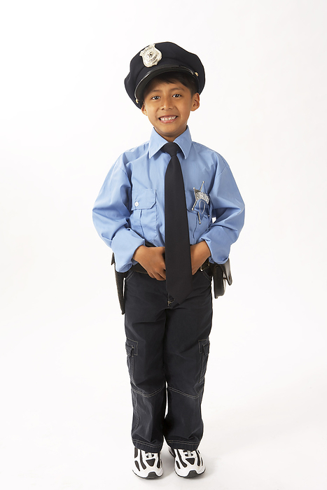 Boy Dressed as Police Officer, by Edward Pond / Design Pics