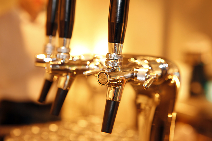 Close-up of Beer Taps, by Frank Rossbach / Design Pics