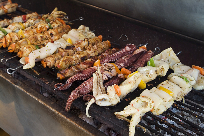 Seafood Skewers on Grill, Thirasia, Santorini, Cyclades Islands, Greece, by Garry Black / Design Pics