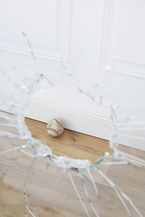 Broken Window and Baseball, by photo division / Design Pics