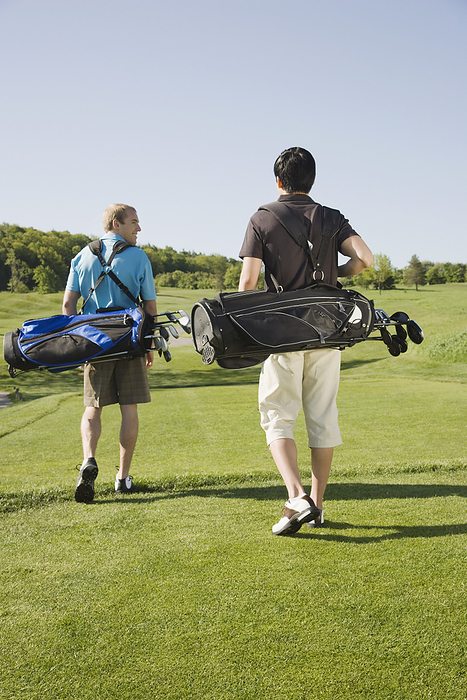 Men at Golf Course, by Hiep Vu / Design Pics