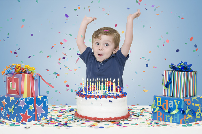 Young Boy with Birthday Cake and Presents, by Jason A. Randazzo / Design Pics