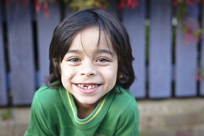 Portrait of Boy with Missing Tooth, by Matt Brasier / Design Pics