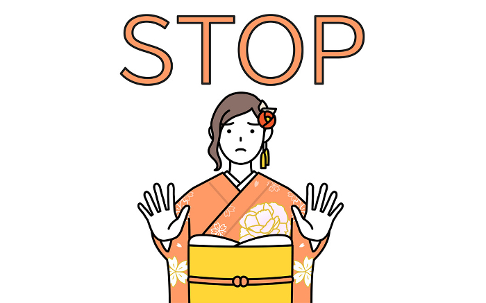 Signaling a stop, a woman in a furisode kimono thrusting her hand in front of her body, at a New Year's hatsumode, a coming-of-age ceremony, a graduation ceremony or a wedding, etc.