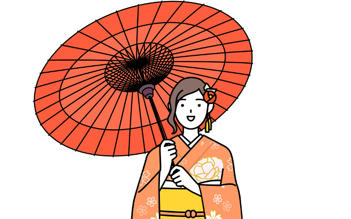 A woman in furisode (long-sleeved kimono) with a smile and a wagasa umbrella, at the New Year's New Year's visit, a coming-of-age ceremony, a graduation ceremony, or a wedding ceremony.