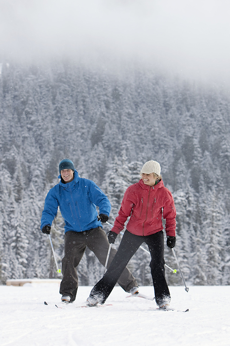 Couple Cross Country Skiing, Whistler, British Columbia, Canada, by Noel Hendrickson / Design Pics