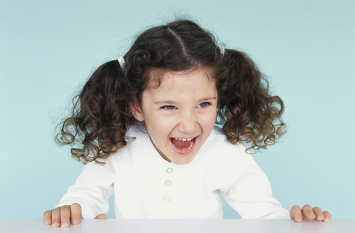 Girl Laughing, by Norbert Schäfer / Design Pics