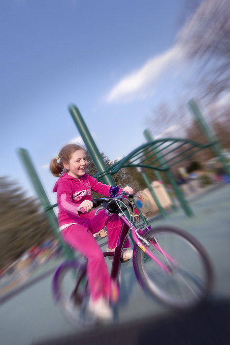 Girl Riding Bike, Bethesda, Maryland, USA, by Patrick Chatelain / Design Pics