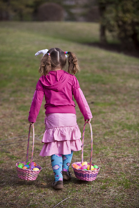 Young Girl Walking with Easter Baskets, by Patrick Chatelain / Design Pics