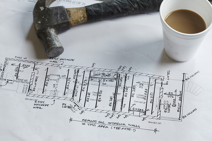 Home Renovation Still Life with Hammer, Blueprint and Styrofoam Coffee Cup, by Peter Reali / Design Pics