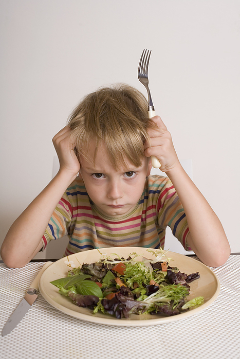 Boy Refusing to Eat Salad, by Raoul Minsart / Design Pics