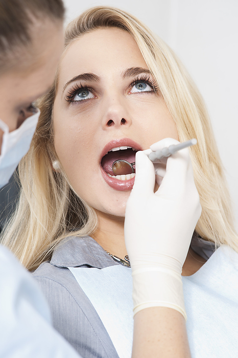 Young Woman getting Check-up at Dentist's Office, Germany, by Uwe Umstätter / Design Pics