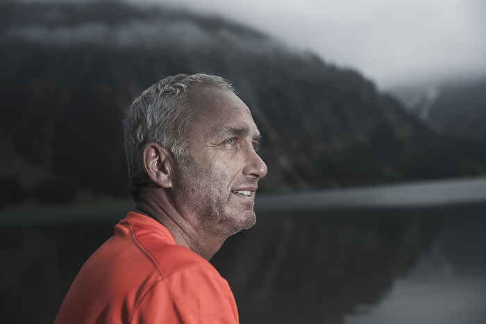 Close-up of Mature Man by Lake, Vilsalpsee, Tannheim Valley, Tyrol, Austria, by Uwe Umstätter / Design Pics