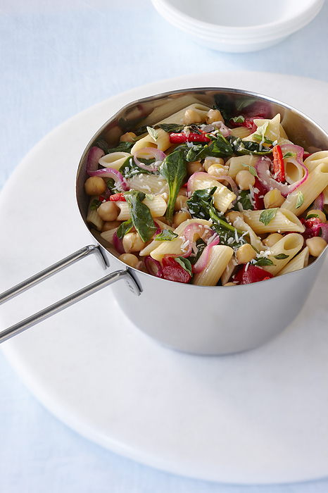 Pot with Penne, Chickpeas and Spinach, Studio Shot, by Yvonne Duivenvoorden / Design Pics