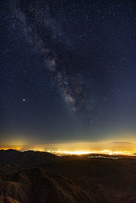 The Milky way over palm springs as seen from Keys View in Joshua Tree National Park; Palm Springs, California, United States of America, by Ben Horton / Design Pics