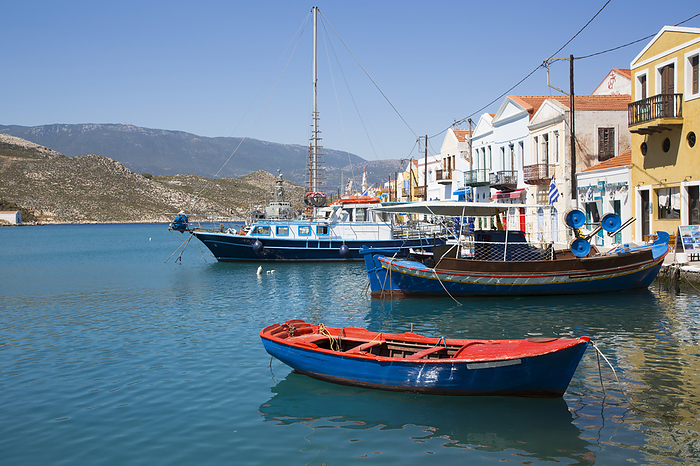 Boats moored in the harbor of the historical island of Kastellorizo (Megisti) Island; Dodecanese Island Group, Greece, by Richard Maschmeyer / Design Pics