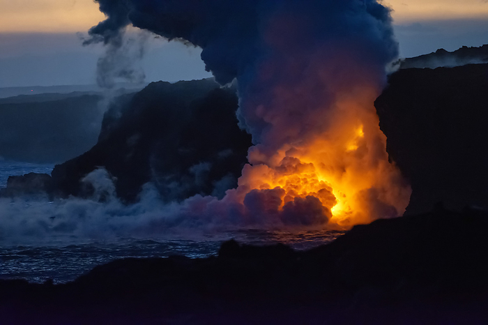 Hawaii Hawaii Island Hot lava illuminates a huge column of noxious gas as it enters the ocean and lights up the darkness on the Big Island of Hawaii  Hawaii, United States of America, by Jim Lavrakas   Design Pics