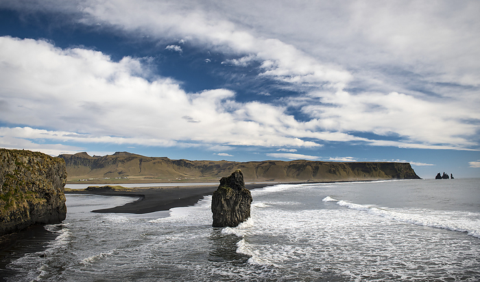 Iceland View of cliffs and black sand beach, Reynisfjara Beach, on the South Coast of Iceland, near the town of Vik, with dramatic sky  Iceland, by Christopher Roche   Design Pics