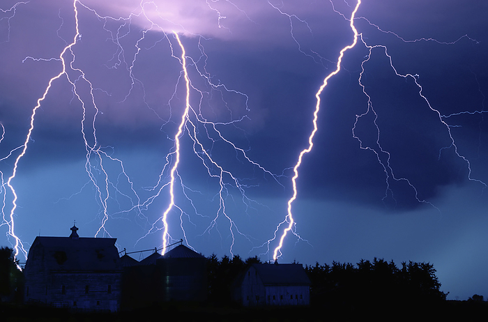 America Lightning strikes fill the night sky over a farm and barn rooftop, near Walton, Nebraska, USA  Walton, Nebraska, United States of America, by Joel Sartore Photography   Design Pics