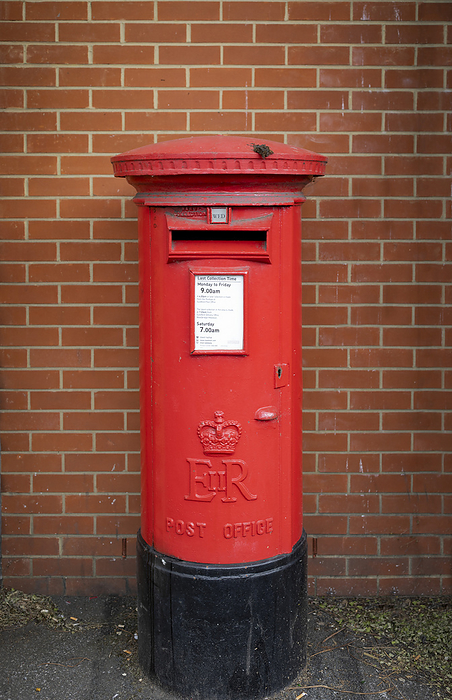 Red post box in the United Kingdom with Queen Elizabeth's cypher; Guildford, Surrey, England, by Lorna Rande / Design Pics