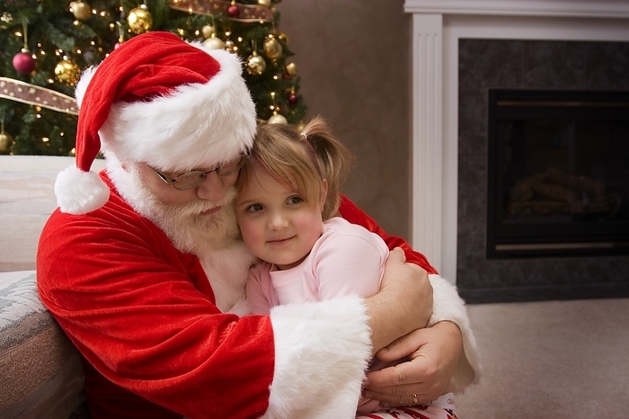 Santa Claus Hugging A Little Girl, by Steve Nagy / Design Pics