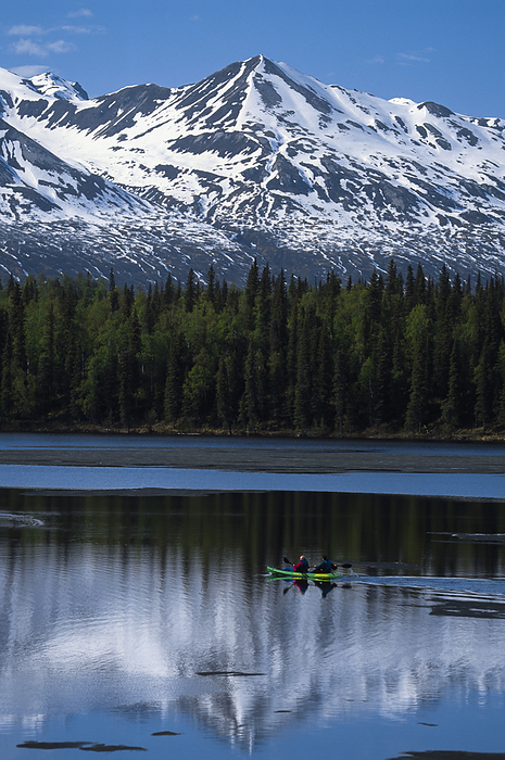 Kayakers in Denali State Park, Alaska, USA; Alaska, United States of America, by Michael Melford / Design Pics