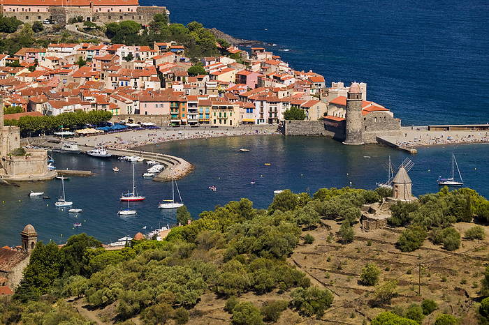 Sailboats in the harbour of Collioure; Collioure, Pyrenees Orientales, France, by Michael Melford / Design Pics