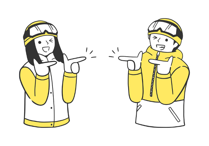 A couple of men and women in winter sports wear happily pointing with both hands