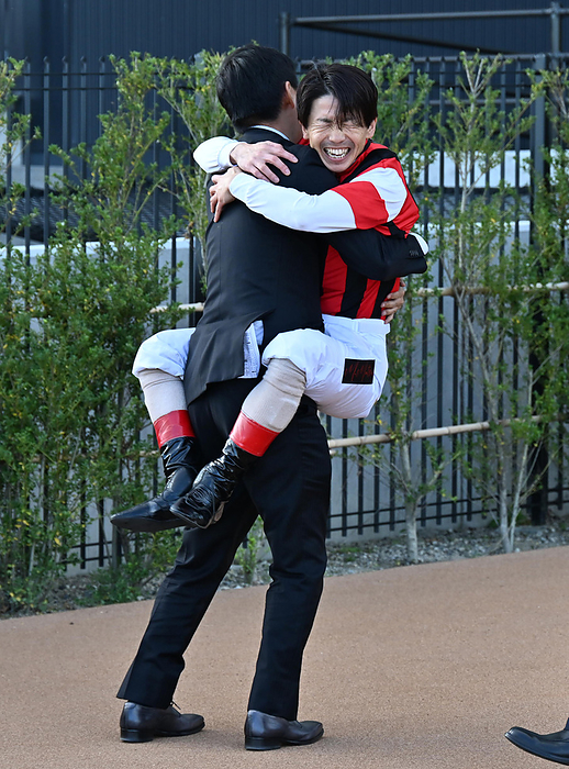2023 Swan Stakes  G2  October 28, 2023 Horse Racing Race 11R Swan Stakes 1 Place  3 Wing Ray Test Jockey Masaumi Matsuoka hugging officials Place Kyoto