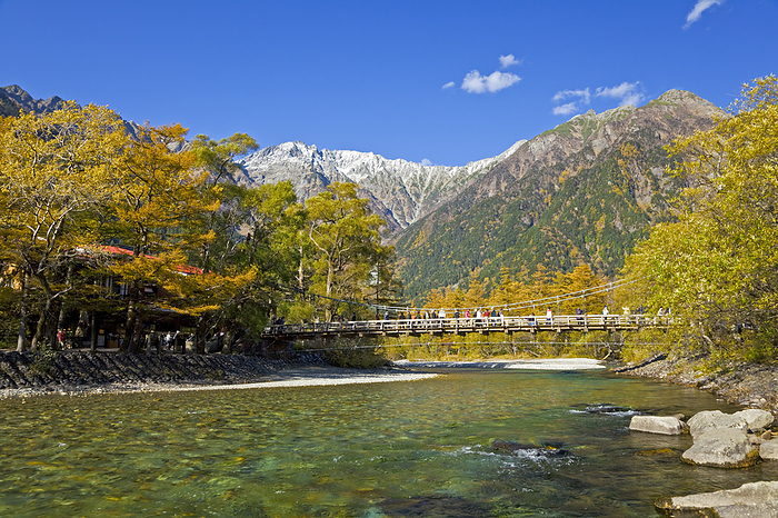Azusa River, Kappa bashi Bridge, and the Hotaka mountain range with fresh snow Nagano Prefecture  