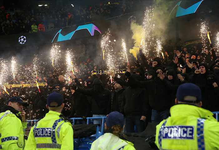 Manchester City v BSC Young Boys: Group G   UEFA Champions League 2023 24 Police watch Young Boys fans with flares before the UEFA Champions League match between Manchester City and BSC Young Boys at Etihad Stadium on November 7, 2023 in Manchester, United Kingdom.   WARNING  This Photograph May Only Be Used For Newspaper And Or Magazine Editorial Purposes. May Not Be Used For Publications Involving 1 player, 1 Club Or 1 Competition Without Written Authorisation From Football DataCo Ltd. For Any Queries, Please Contact Football DataCo Ltd on  44  0  207 864 9121